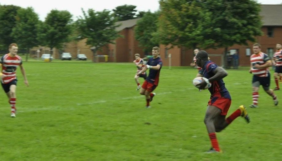 Amdani Rugby Rugby players in action on the field